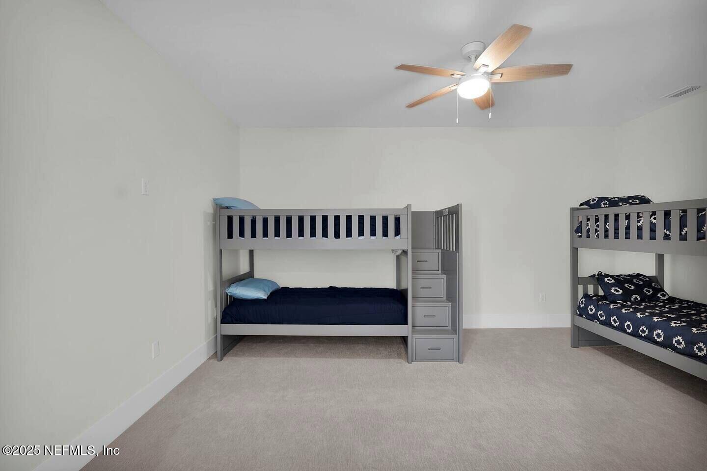 586 A1A North Ponte Vedra Beach, FL 32082 - Photo 28 of 29 a bedroom with furniture and window