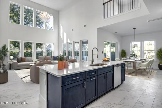 a large kitchen with a large counter top space