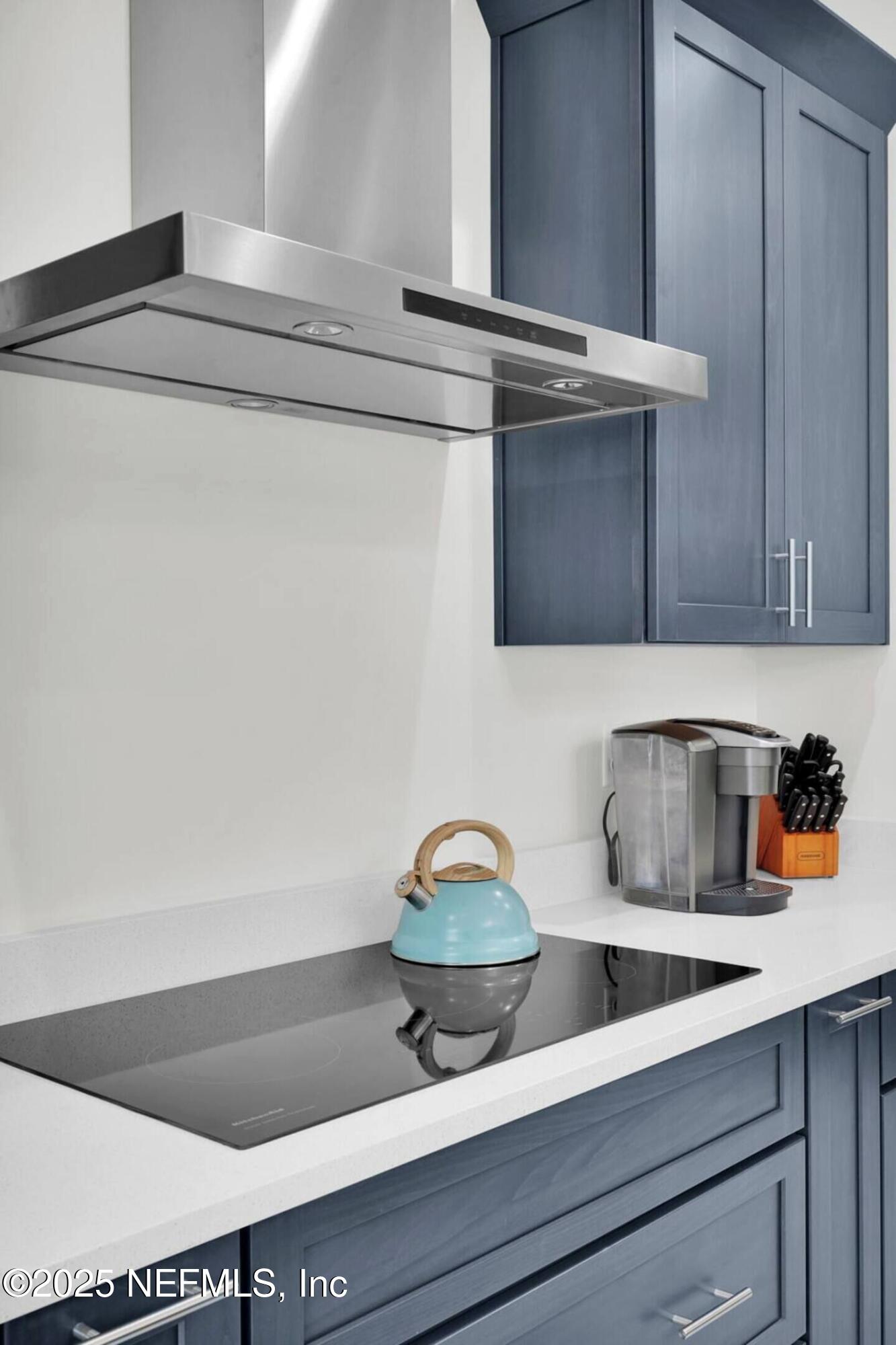 586 A1A North Ponte Vedra Beach, FL 32082 - Photo 10 of 29 a kitchen with a sink and cabinets
