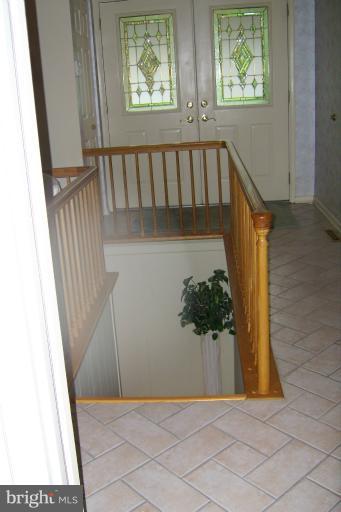 6 Eden Roc Court Baltimore, MD 21208 - Photo 23 of 30 View of Walkway Leading to Basement