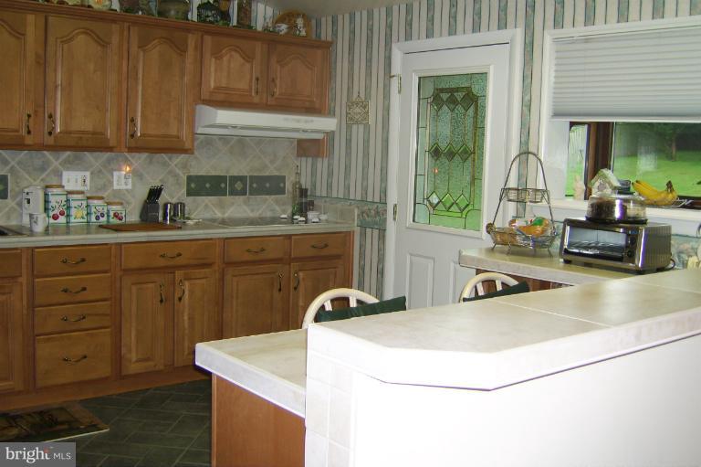 6 Eden Roc Court Baltimore, MD 21208 - Photo 6 of 30 Maple Wood Cabinetry with Ceramic Tile Flooring