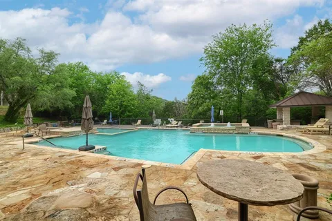 a view of a lake with a yard
