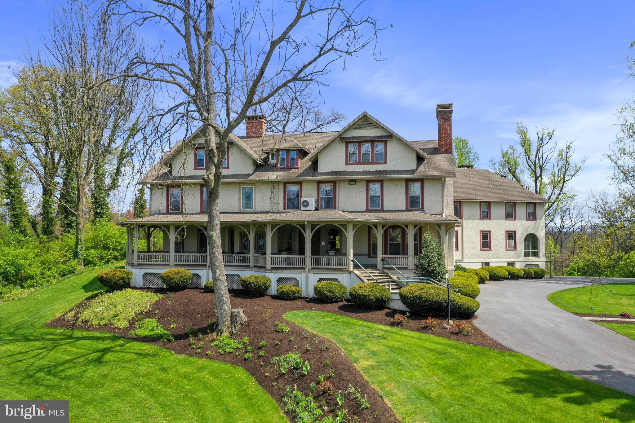 1090 Ragged Edge Road Chambersburg, PA 17202 - Photo 2 of 93 a front view of a house with a yard table and chairs