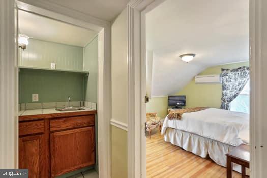 1090 Ragged Edge Road Chambersburg, PA 17202 - Photo 27 of 93 a bedroom with a bed and wooden floor