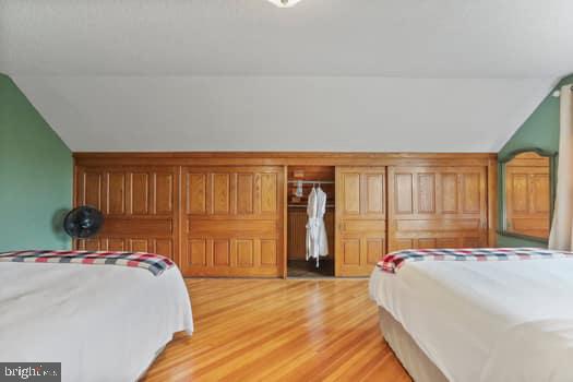 1090 Ragged Edge Road Chambersburg, PA 17202 - Photo 29 of 93 a bed sitting in a bedroom next to a window