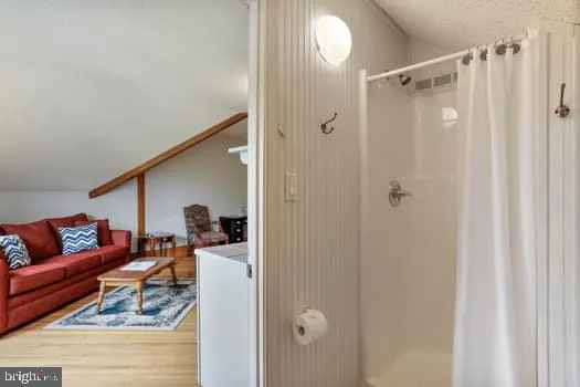 a view of entryway with wooden floor
