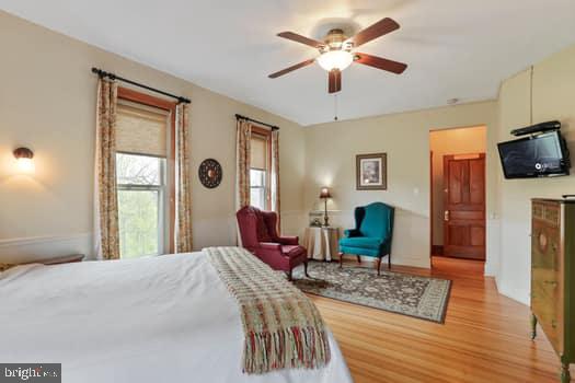 1090 Ragged Edge Road Chambersburg, PA 17202 - Photo 44 of 93 a bedroom with a bed dresser and a window