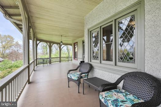 1090 Ragged Edge Road Chambersburg, PA 17202 - Photo 7 of 93 a living room with furniture and a large window