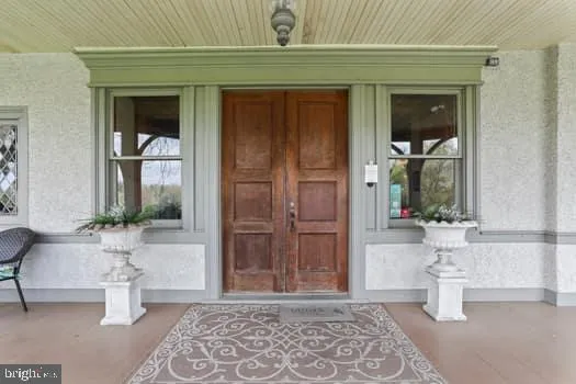 a view of entryway with a front door