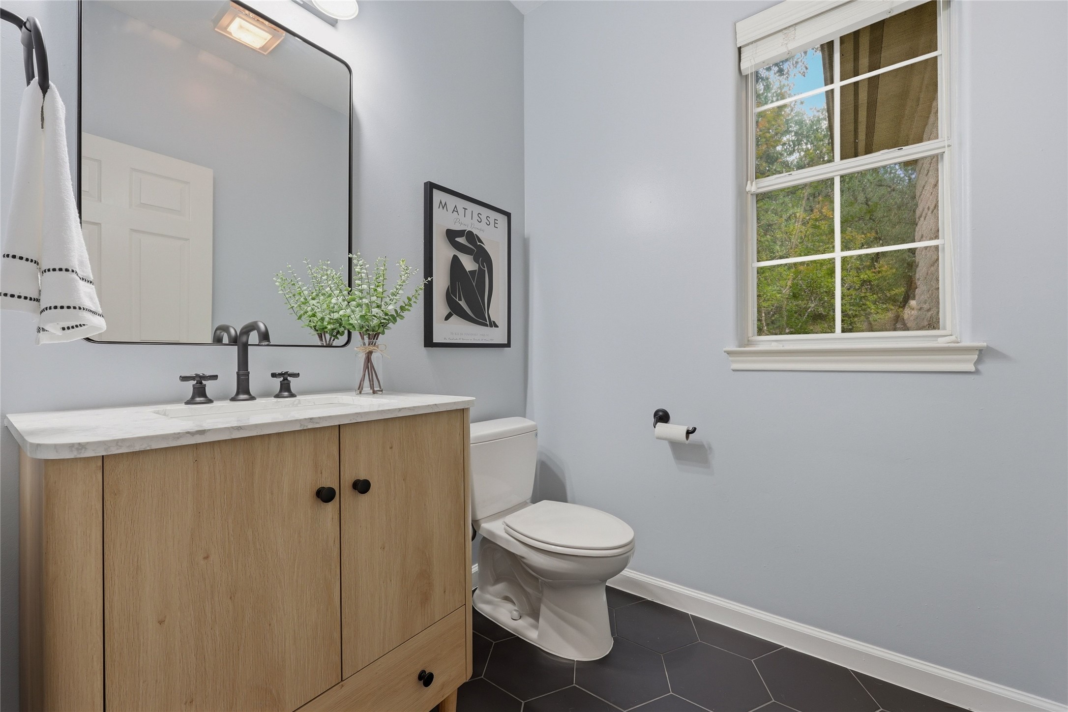 10802 Beach Road Leander, TX 78641 - Photo 22 of 40 Newly remodeled powder bathroom on the main level.