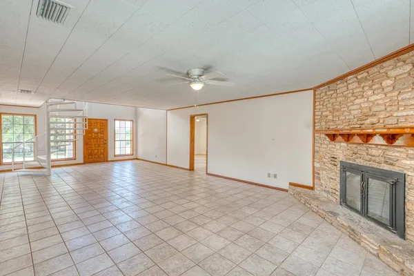 a view of an empty room and window