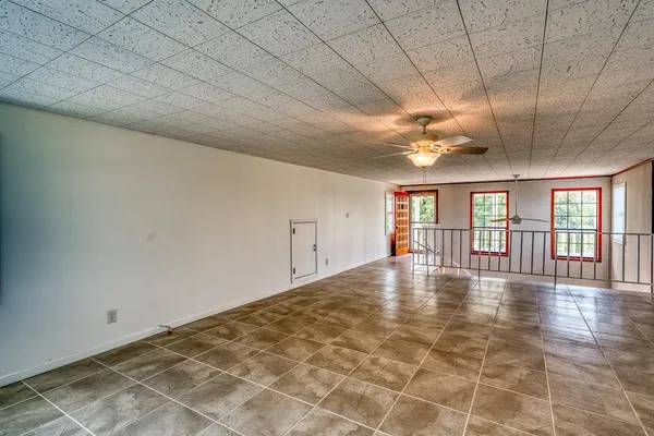 a view of balcony with wooden floor