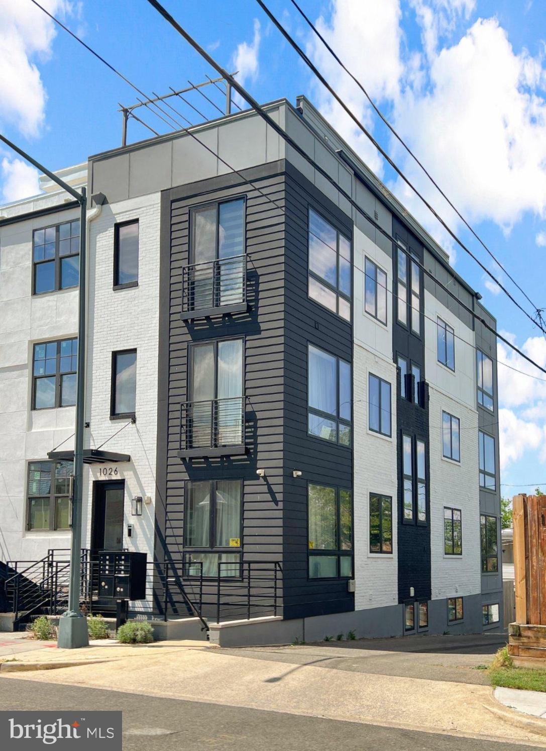 1026 18th Street Northeast, Unit PH7 Washington, DC 20002 - Photo 17 of 21 a view of a building on a street