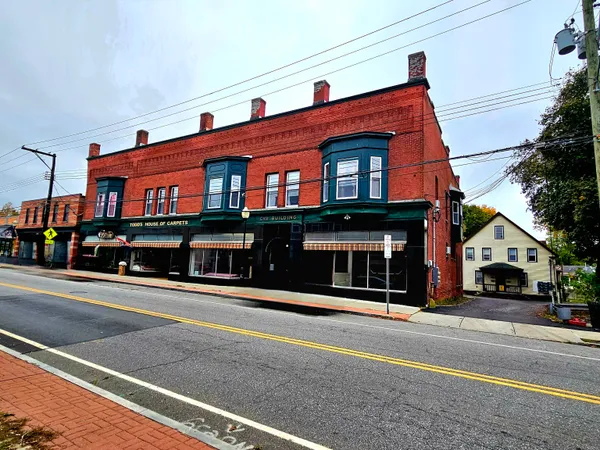 a front view of a building with street