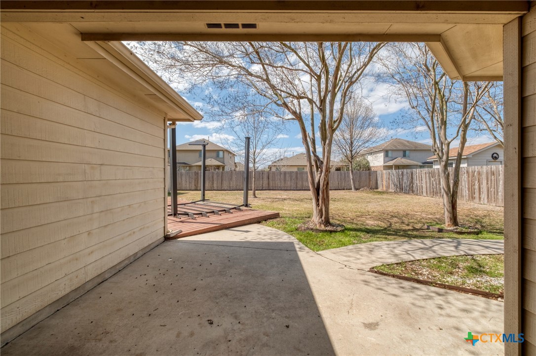 513 South Mockingbird Lane Lockhart, TX 78644 - Photo 22 of 25 a view of a house with a snow on the road