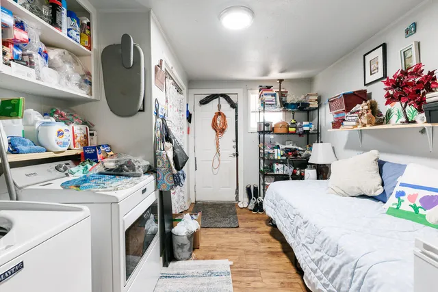 a bed room with a bed and a couch