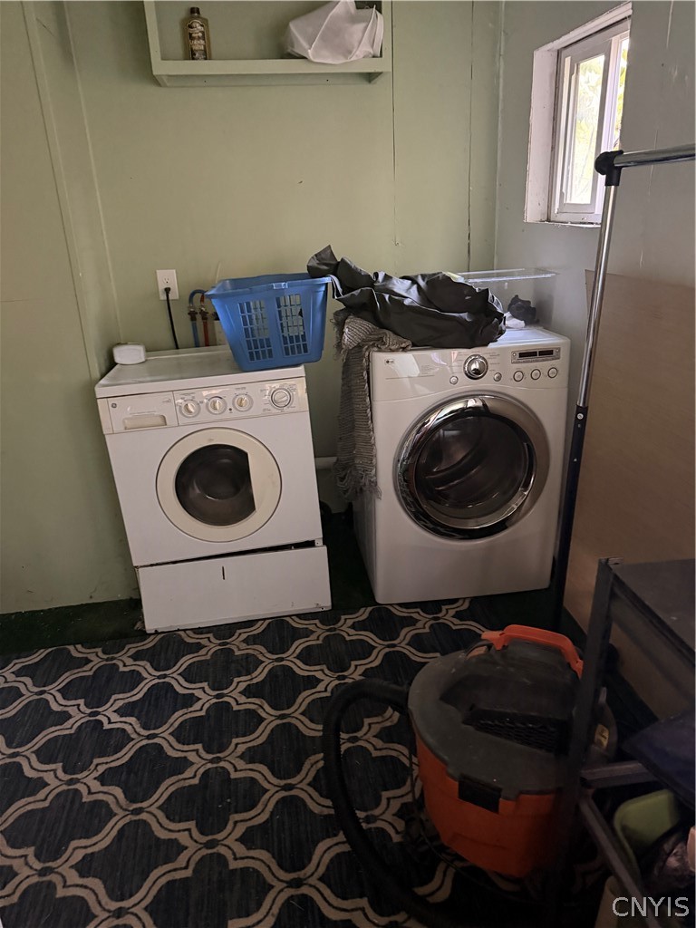 2025 Apulia Road LaFayette, NY 13084 - Photo 6 of 16 A dedicated laundry space provides direct utility hookups alongside a high-positioned window.