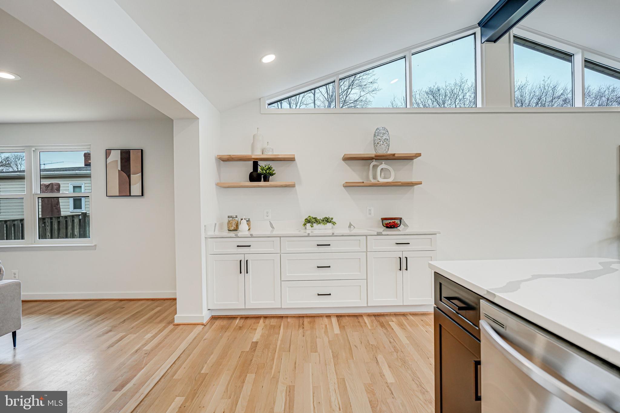 5108 Sutton Place Alexandria, VA 22304 - Photo 13 of 53 a kitchen with a stove cabinets and wooden floor