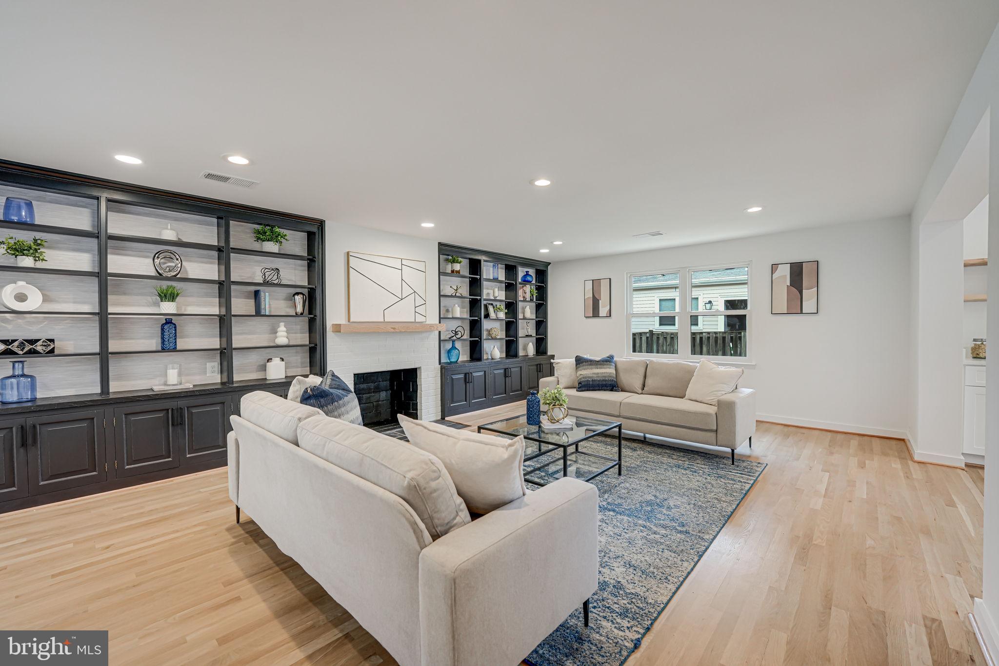 5108 Sutton Place Alexandria, VA 22304 - Photo 18 of 53 a living room with furniture and a fireplace