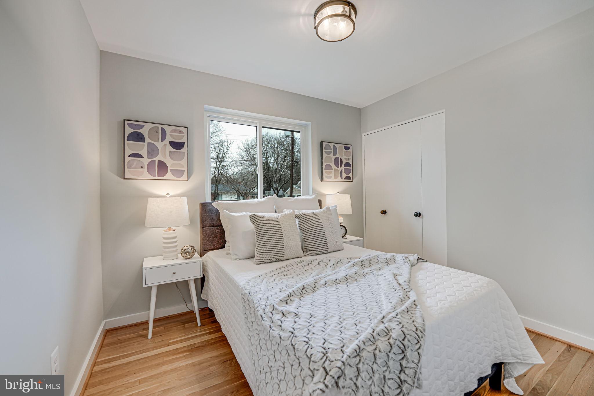 5108 Sutton Place Alexandria, VA 22304 - Photo 29 of 53 a bed room with a bed and a chair