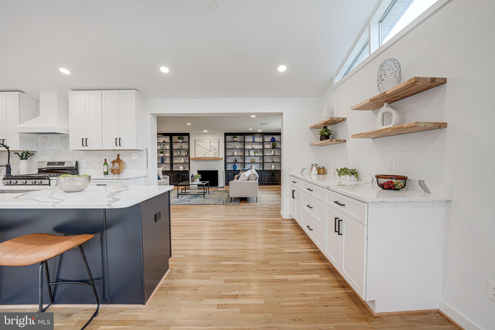 5108 Sutton Place Alexandria, VA 22304 - Photo 8 of 53 a large white kitchen with lots of counter space cabinets and appliances