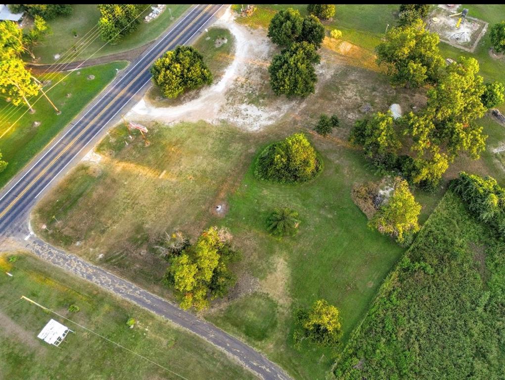 Tbd North Commerce Street Bremond, TX 76629 - Photo 5 of 7 a view of a garden from a balcony