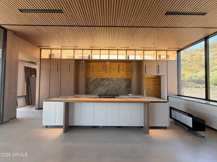 a view of a glass door with a floor to ceiling window