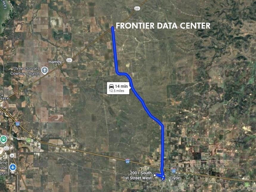 2001 South 1st Clyde, TX 79510 - Photo 4 of 10 a street sign that is on a brick wall