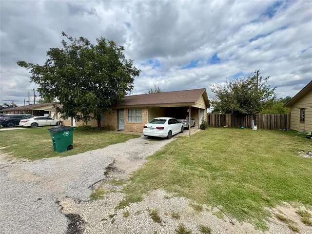 a house view with a garden space