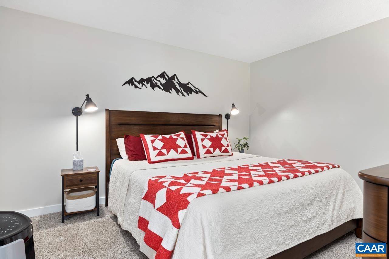 2240 Tanners Ridge Roseland, VA 22967 - Photo 20 of 30 a bedroom with a bed and a painting on the wall