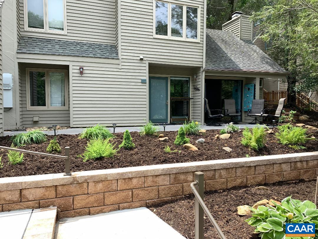 2240 Tanners Ridge Roseland, VA 22967 - Photo 25 of 30 a front view of a house with a yard and potted plants