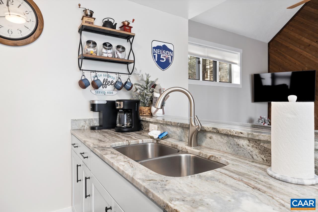 2240 Tanners Ridge Roseland, VA 22967 - Photo 9 of 30 a kitchen with a sink and a stove top oven
