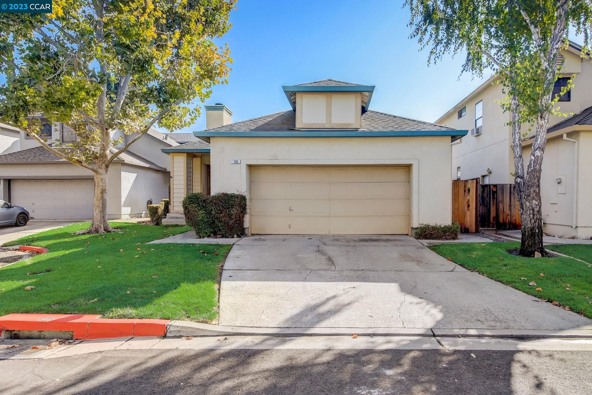 730 Timberline Terrace Brentwood, CA 94513 - Photo 1 of 60 a front view of a house with a yard and a garage