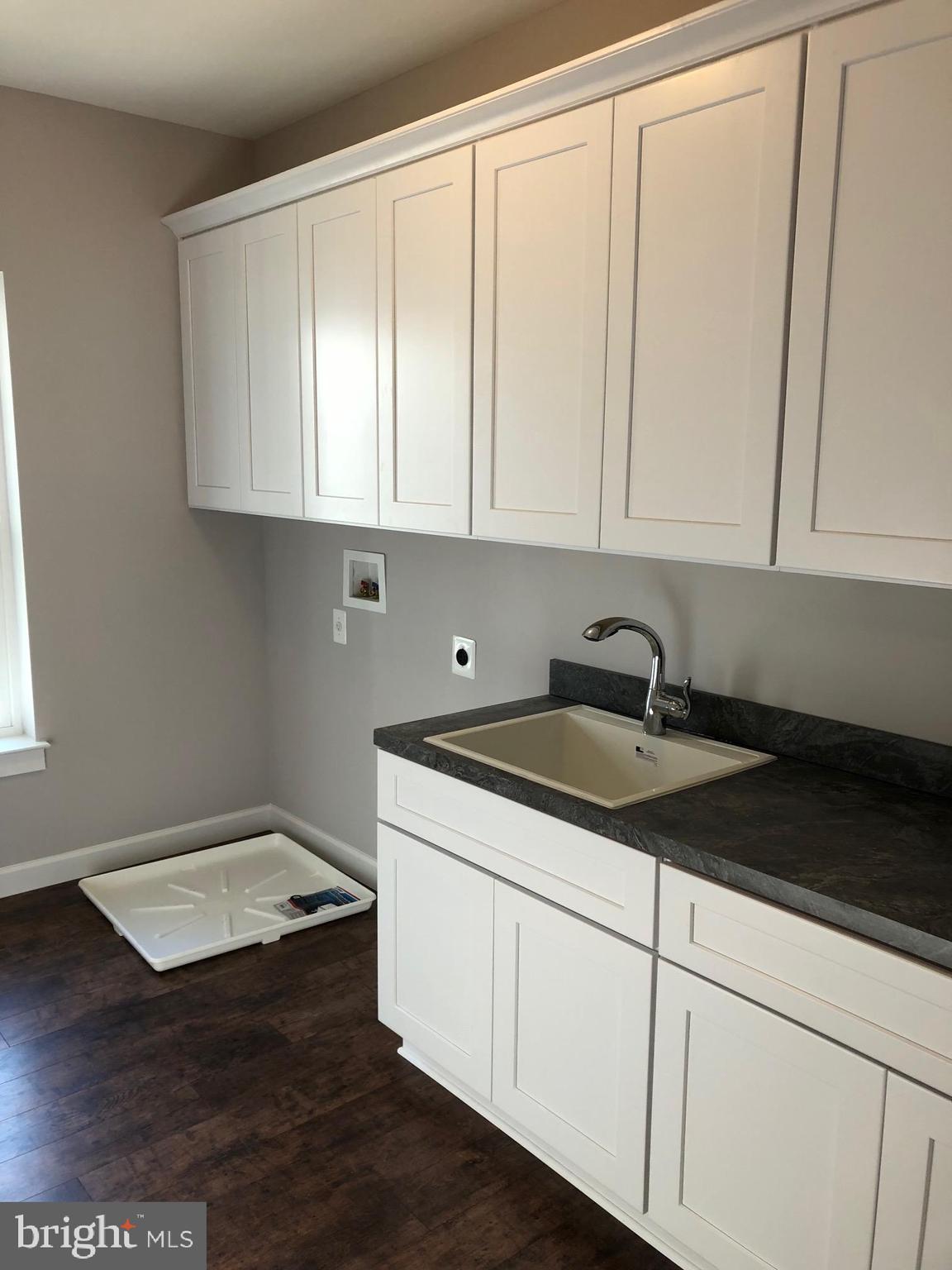 75 Magothy Beach Road Pasadena, MD 21122 - Photo 29 of 50 Laundry Center with Cabinetry