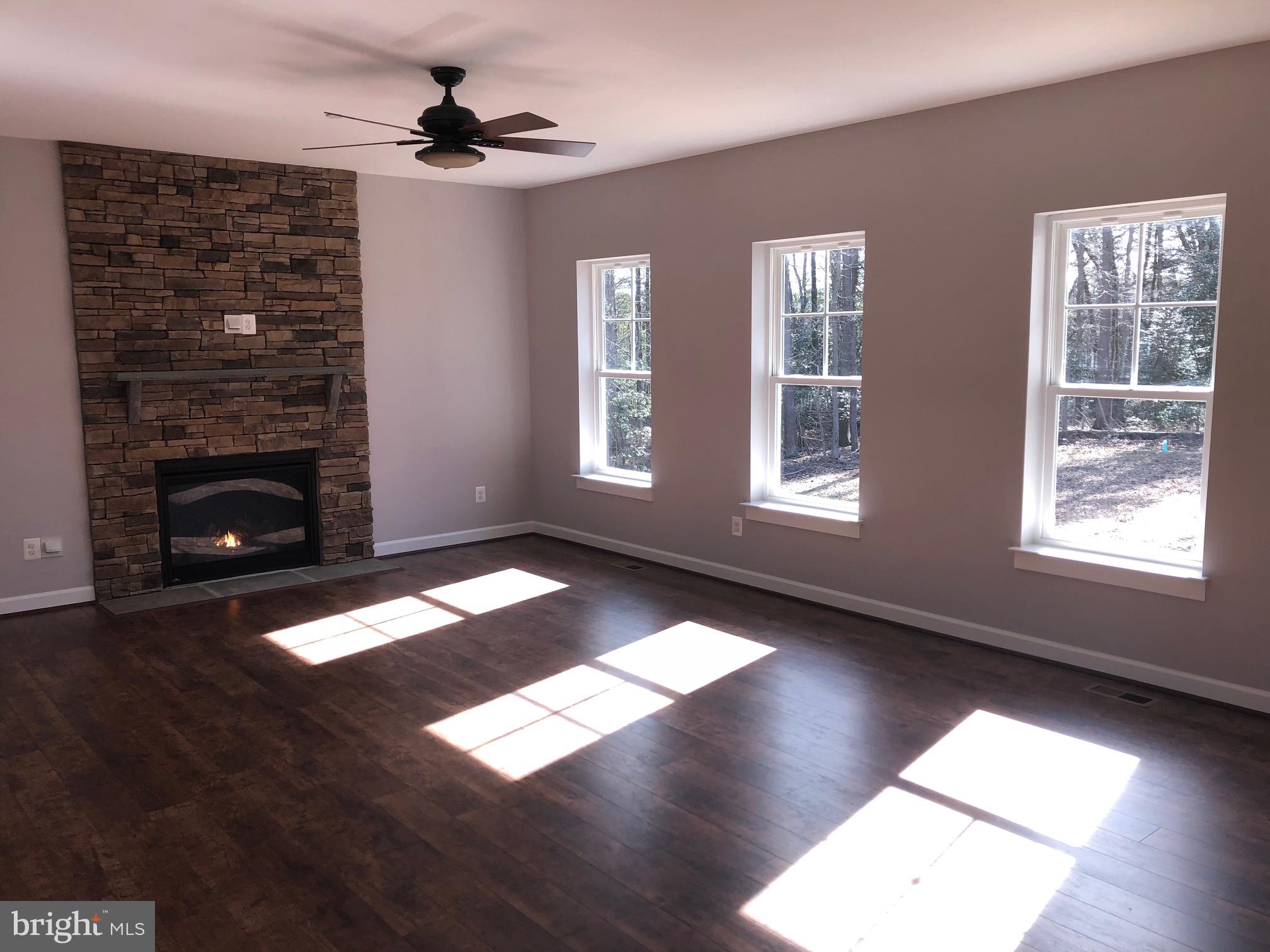 75 Magothy Beach Road Pasadena, MD 21122 - Photo 3 of 50 Light filled Family Room with Gas Fireplace