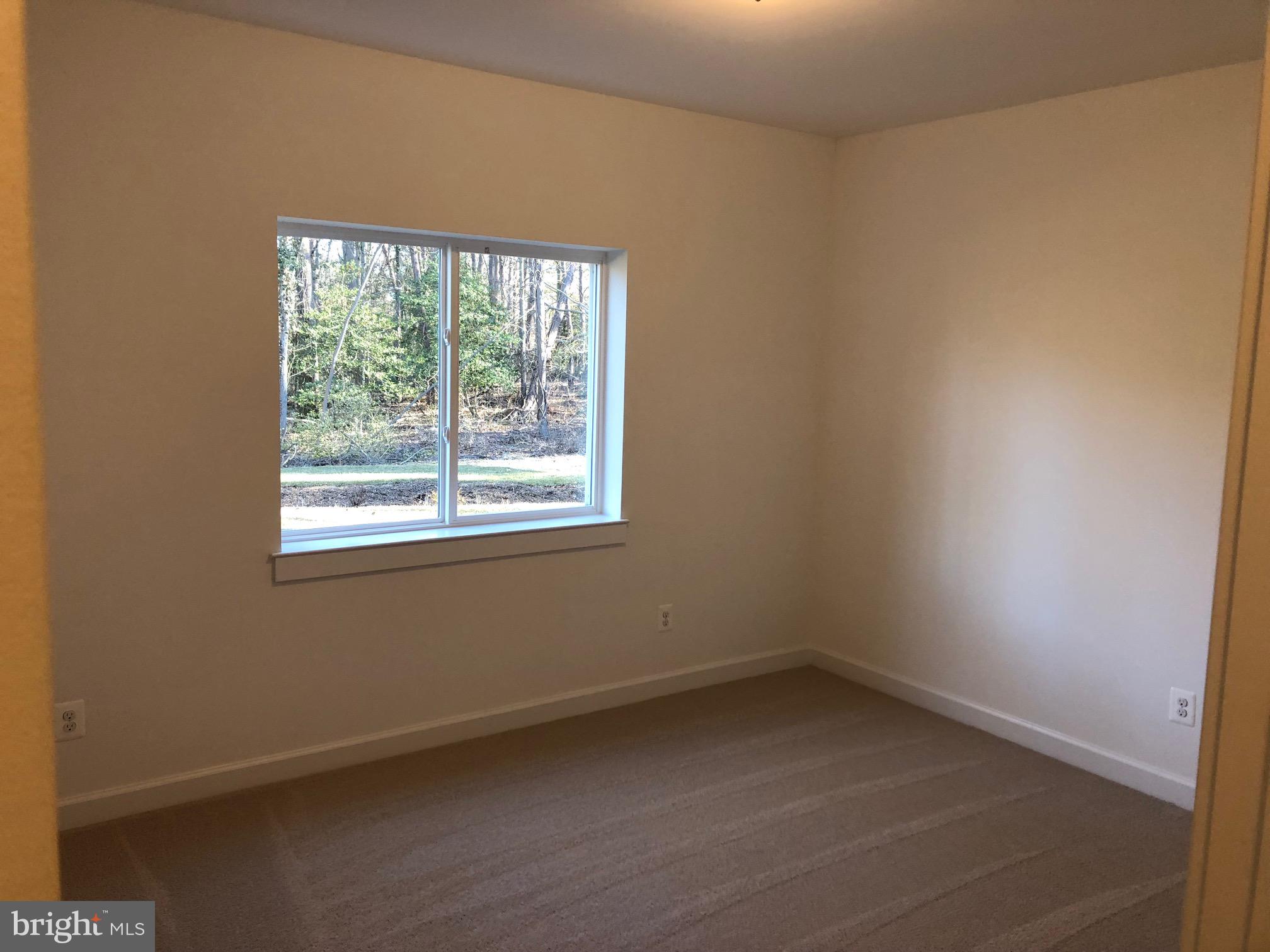 75 Magothy Beach Road Pasadena, MD 21122 - Photo 41 of 50 Light Filled Basement Bedrooom