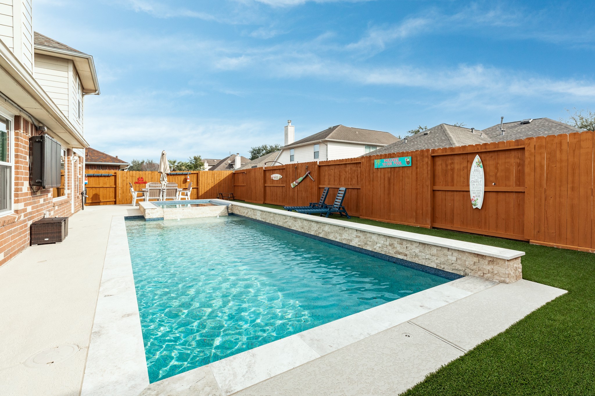 4113 Merlet Drive Pearland, TX 77584 - Photo 29 of 36 Backyard features artificial turf, eliminating the need for mowing, and a new, one-year-old fence.