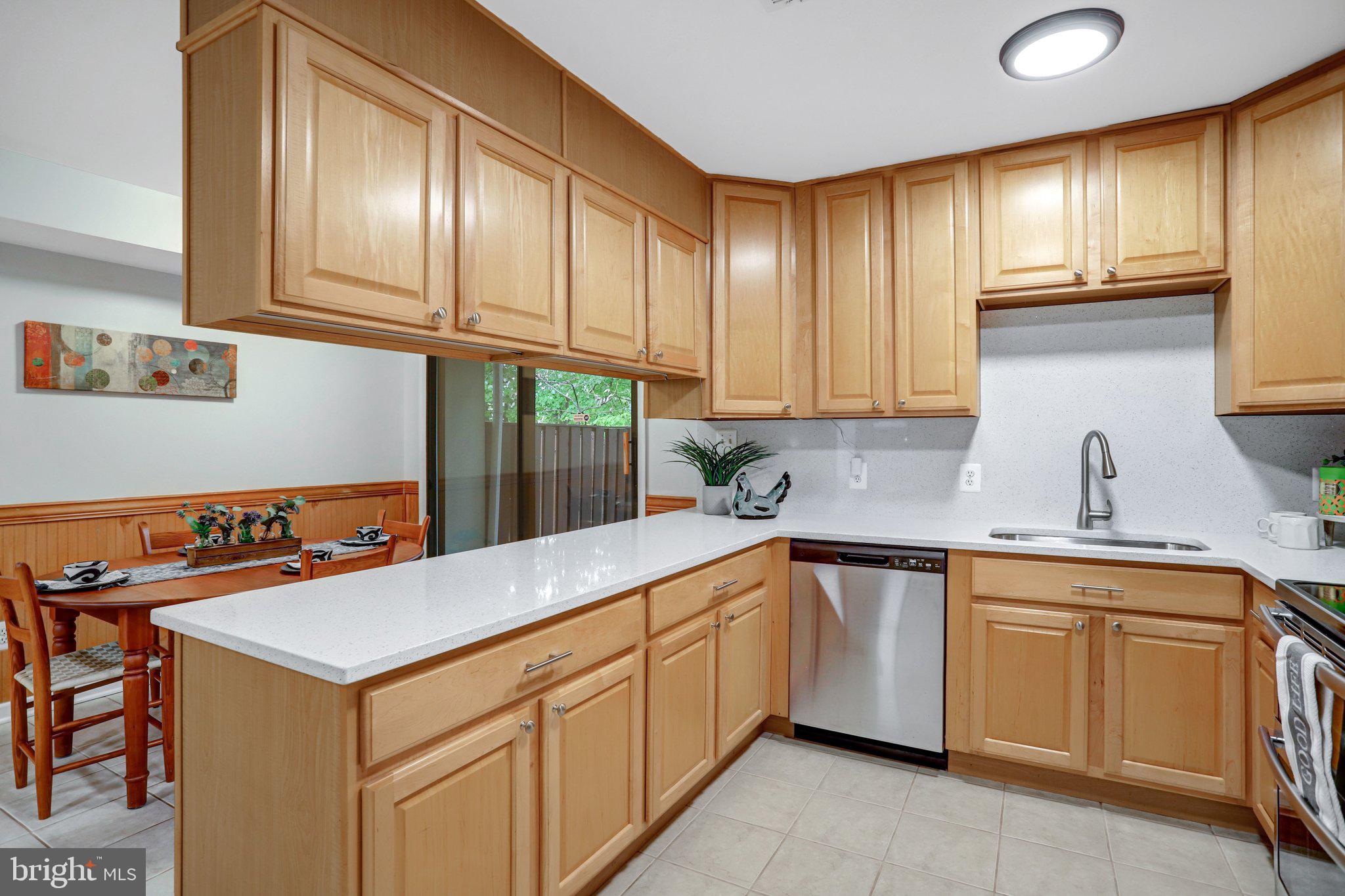 2205 Southgate Square, Unit 2205 Reston, VA 20191 - Photo 11 of 39 Beautiful Quartz Countertop & Backsplash