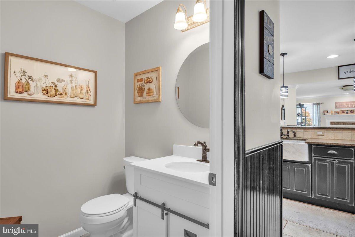 6 Rainbow Drive Sewell, NJ 08080 - Photo 11 of 29 a bathroom with a toilet sink and mirror