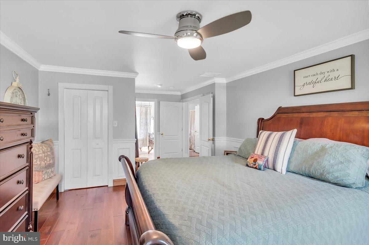 6 Rainbow Drive Sewell, NJ 08080 - Photo 14 of 29 a bedroom with a bed and a chandelier