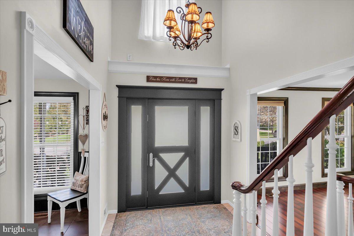 6 Rainbow Drive Sewell, NJ 08080 - Photo 2 of 29 a view of an entryway with wooden floor