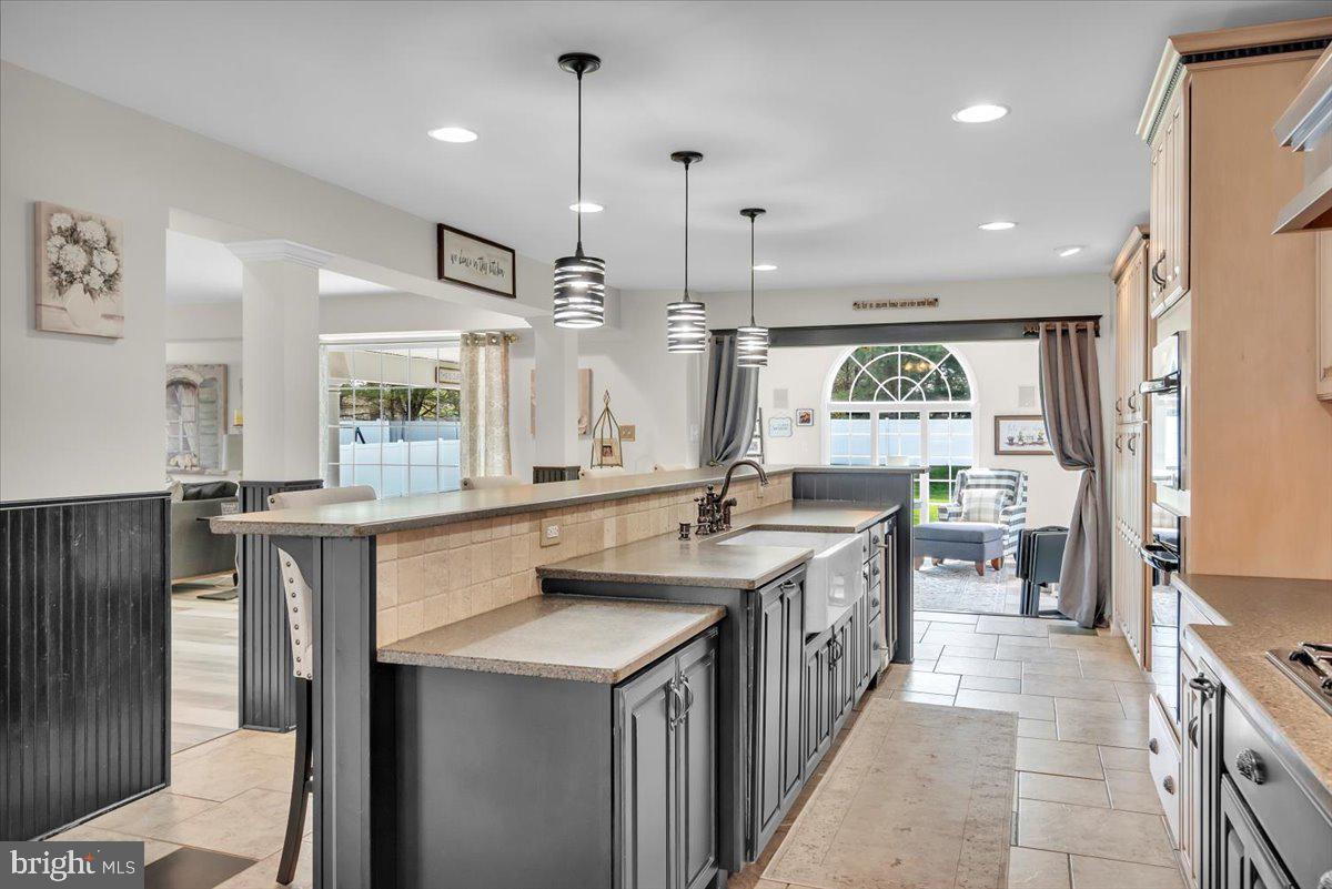 6 Rainbow Drive Sewell, NJ 08080 - Photo 8 of 29 a kitchen with kitchen island a sink stove and refrigerator