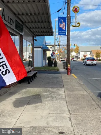 a view of a lake with a yard