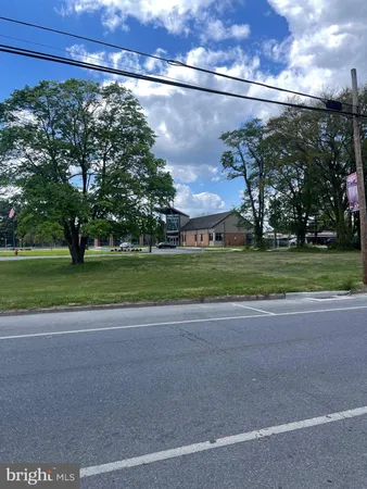 a view of a yard in front of a house