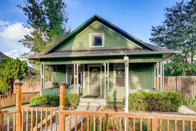 front view of a house with a small yard