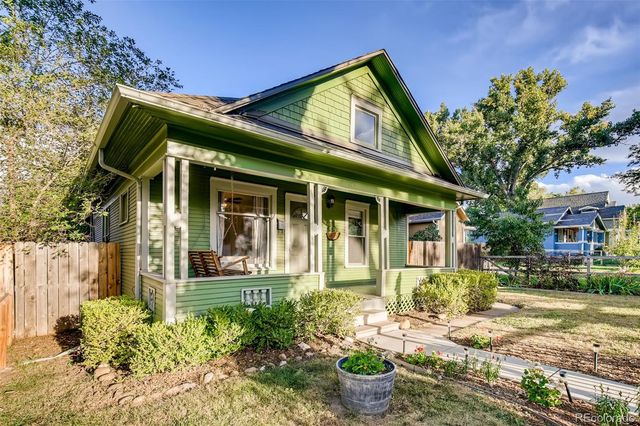 a front view of a house with a porch