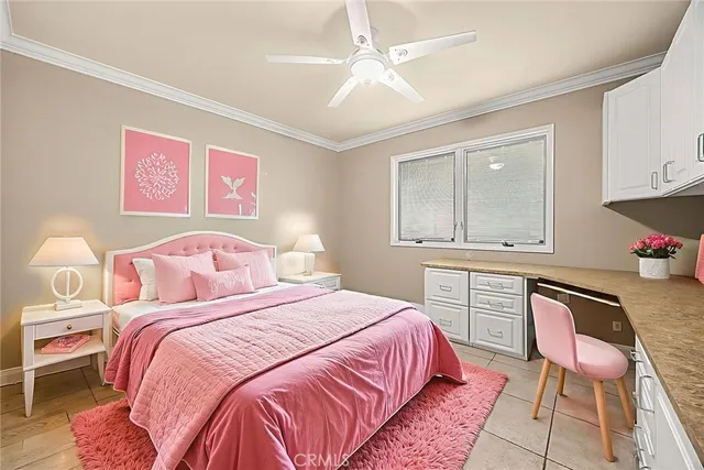 a kitchen with a refrigerator a stove top oven and cabinets