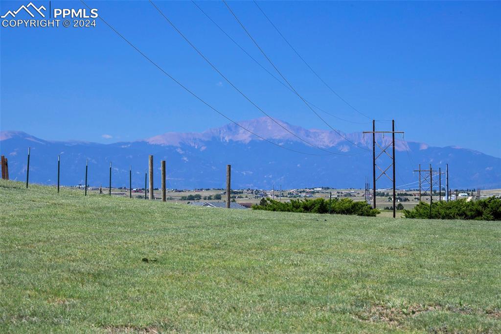 3975 Feather Ridge Drive Peyton, CO 80831 - Photo 2 of 36 a backyard of a house