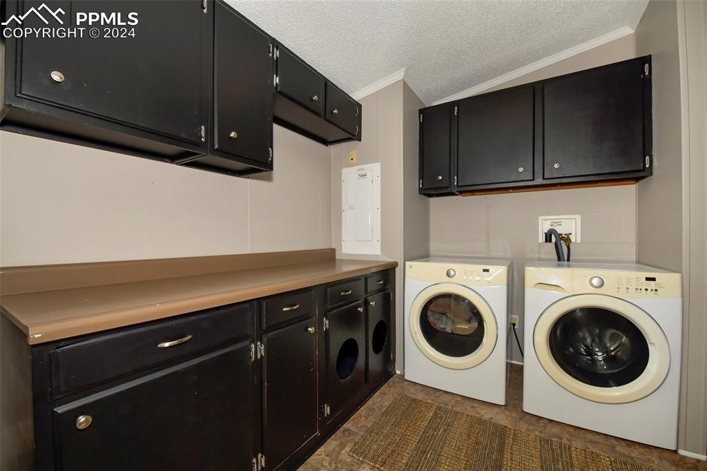 3975 Feather Ridge Drive Peyton, CO 80831 - Photo 36 of 36 a view of a storage and utility room with wooden floor