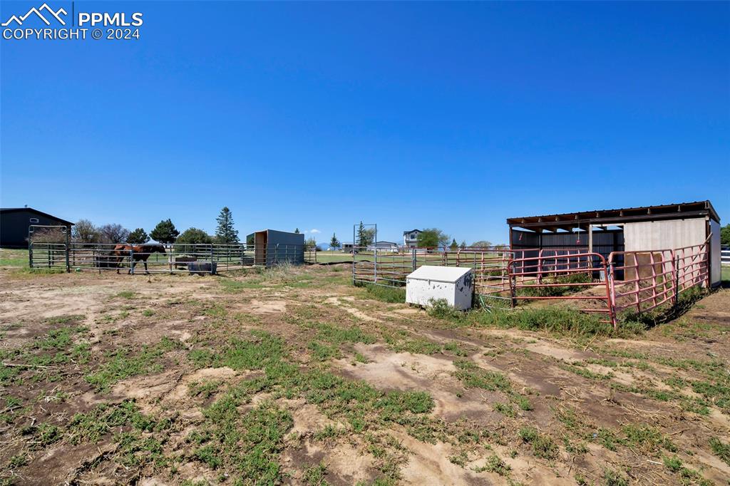 3975 Feather Ridge Drive Peyton, CO 80831 - Photo 8 of 36 a view of a chairs in the patio